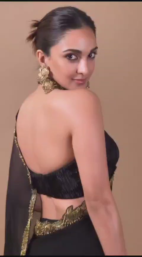 Kiara Advani in Black And Gold Saree Set