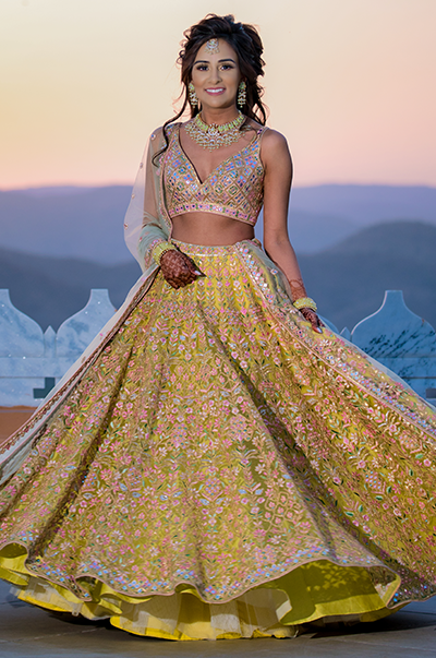 ANJ & PRI in a Green Net Lehenga with a Sage Green Dupatta