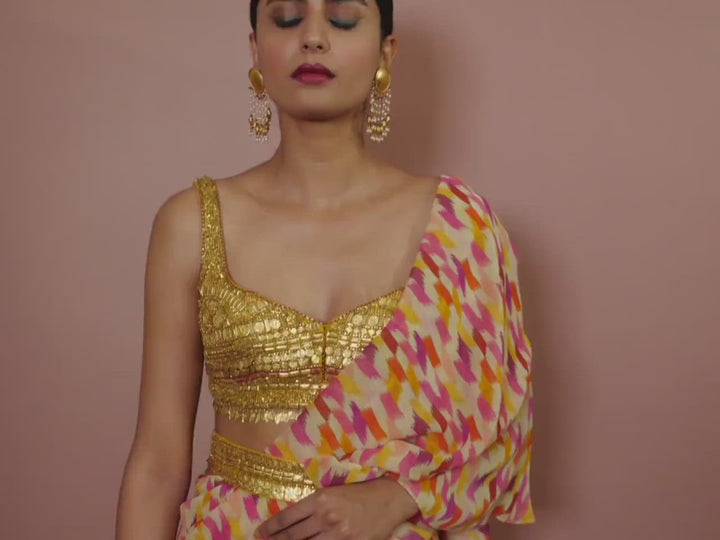 PRINTED SAREE WITH RUFFLES, GOLD METALLIC BLOUSE AND BELT