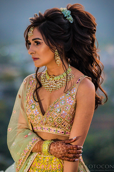 ANJ & PRI in a Green Net Lehenga with a Sage Green Dupatta