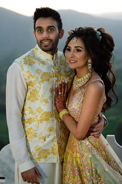 ANJ & PRI in a Green Net Lehenga with a Sage Green Dupatta