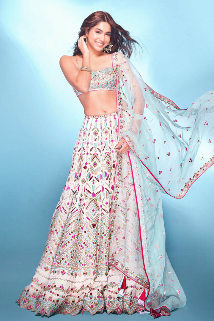 SHARVARI IN IVORY GEORGETTE MULTI COLOURED RESHAM LEHENGA SET