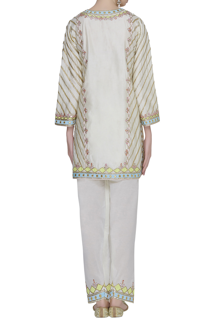 Mitali in IVORY CHANDERI KURTA WITH UNCHI SALWAR SET