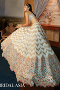 Ivory Georgette Chevron Embroidered Lehenga Paired With A Blue Blouse And Organza Dupatta