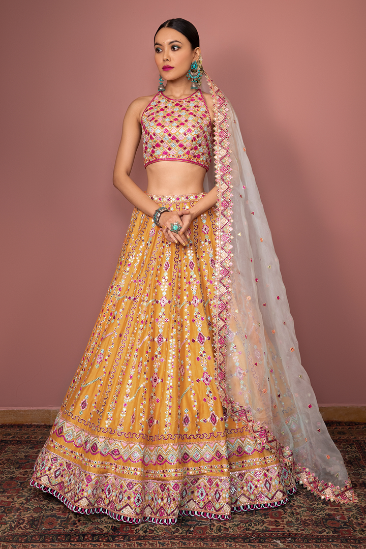 TANGERINE LEHENGA SET WITH HALTER BLOUSE