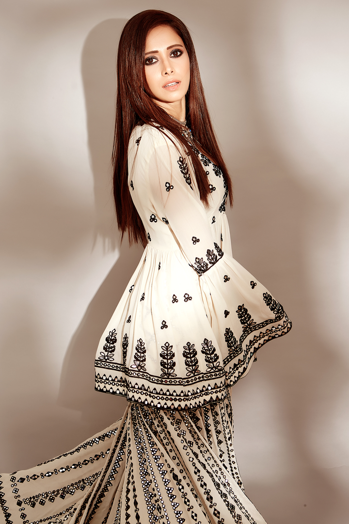NUSHRAT BARUCHA IN BLACK AND WHITE PEPLUM GHARARA SET