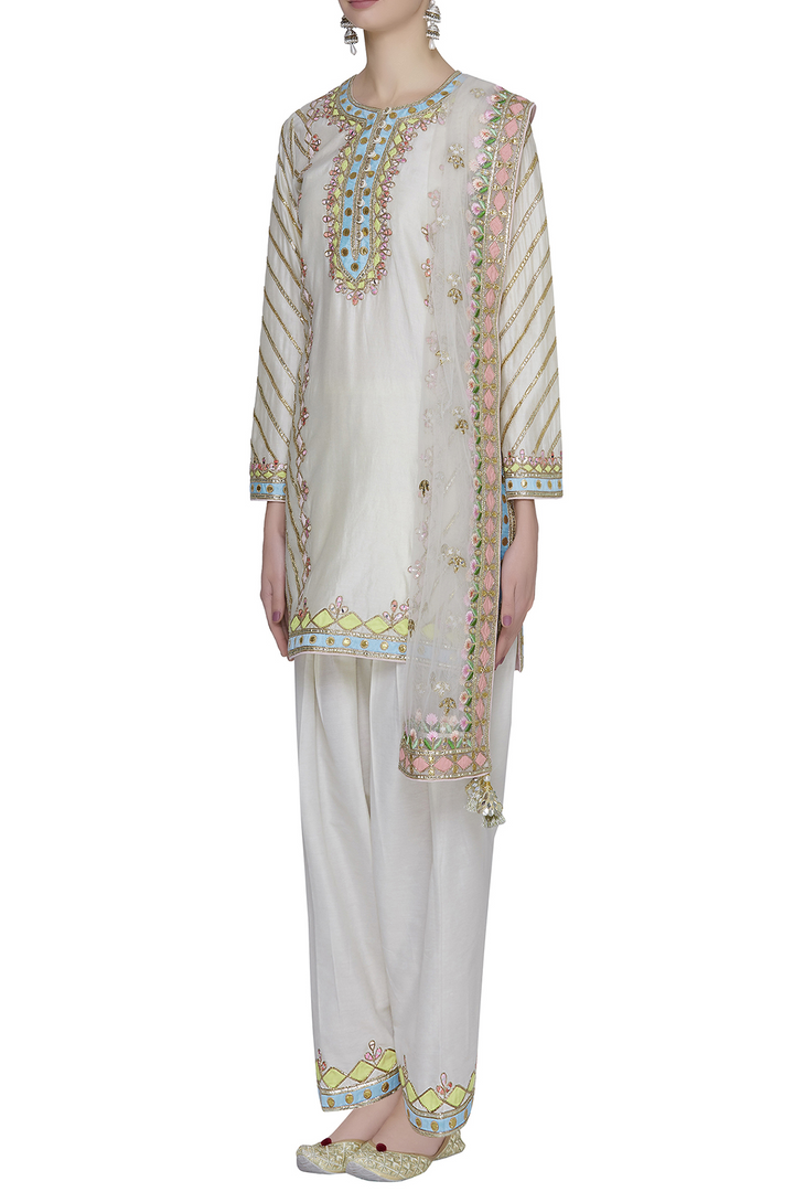 Mitali in IVORY CHANDERI KURTA WITH UNCHI SALWAR SET