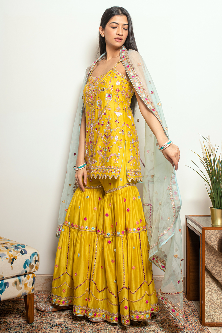 HANNA KHAN IN MUSTARD GHARARA SET