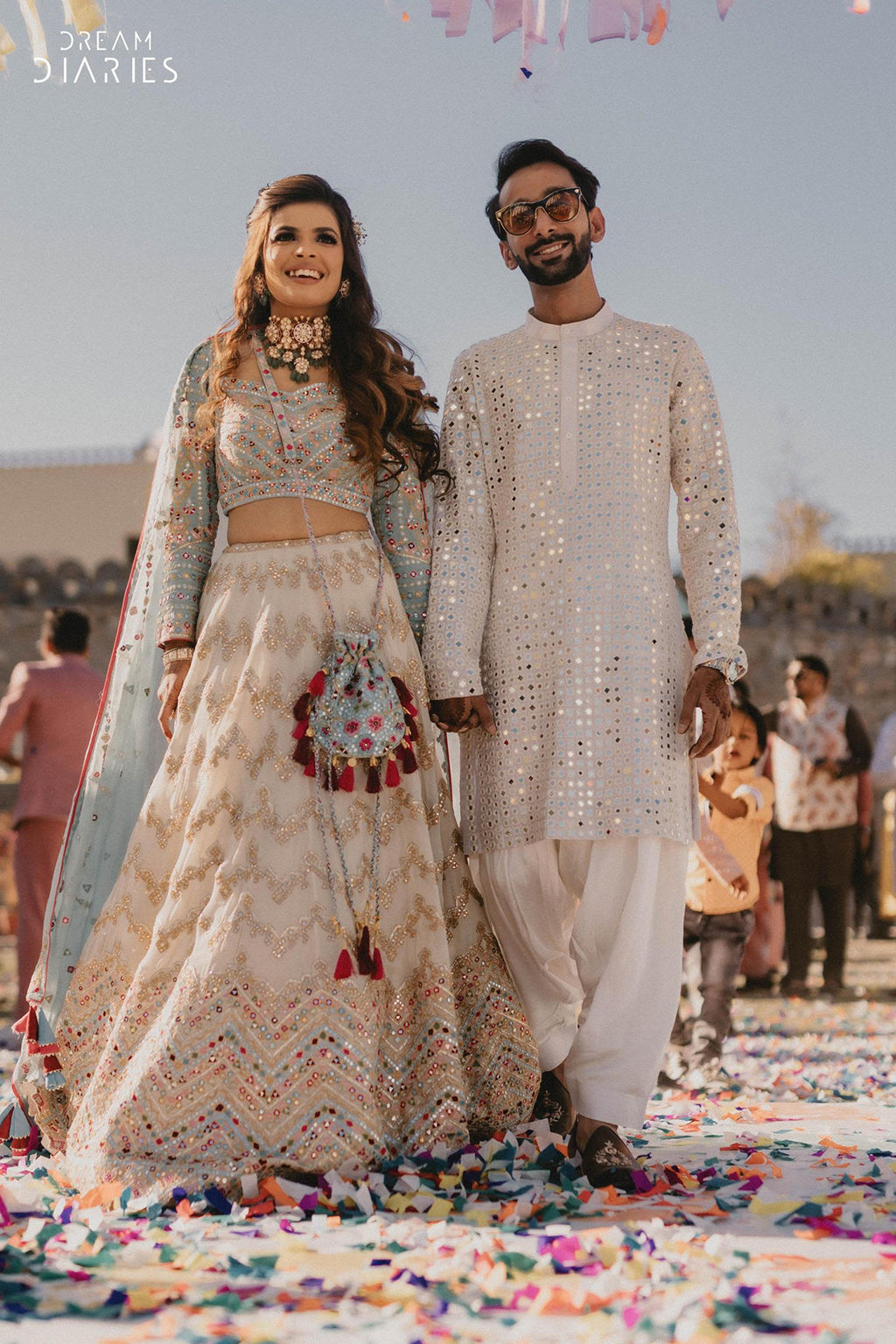 Jhanvi Kothari In Ivory Georgette Chevron Embroidered Lehenga Paired With A Blue Blouse And Organza Dupatta