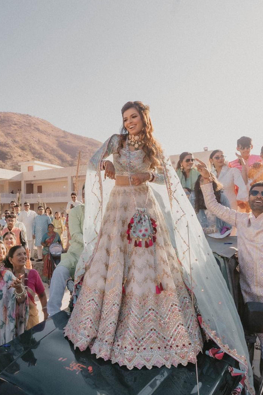 Jhanvi Kothari In Ivory Georgette Chevron Embroidered Lehenga Paired With A Blue Blouse And Organza Dupatta