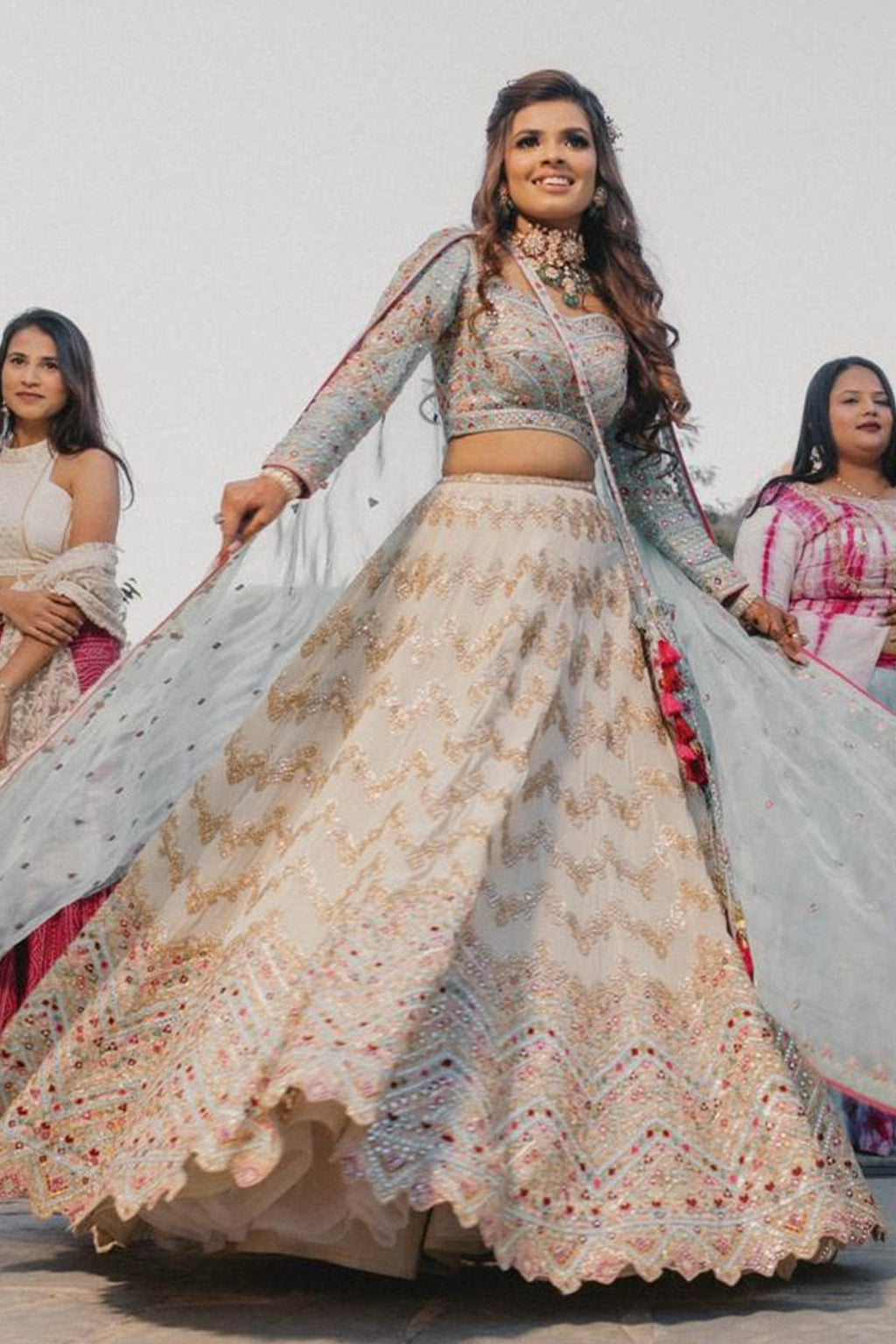 Jhanvi Kothari In Ivory Georgette Chevron Embroidered Lehenga Paired With A Blue Blouse And Organza Dupatta