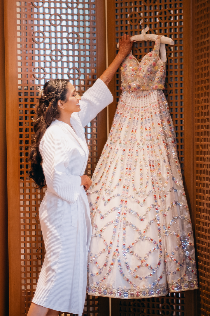 Roshni Lalmalani In Ivory Net Lehenga With 3D Flowers