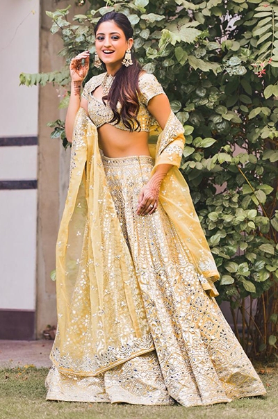 Karishma Yadav In Yellow Chanderi Lehenga With Blue Resham And Foil