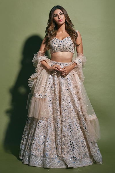 MOUNI ROY in Light Pink Heavy Foil Lehenga with Frill Dupatta