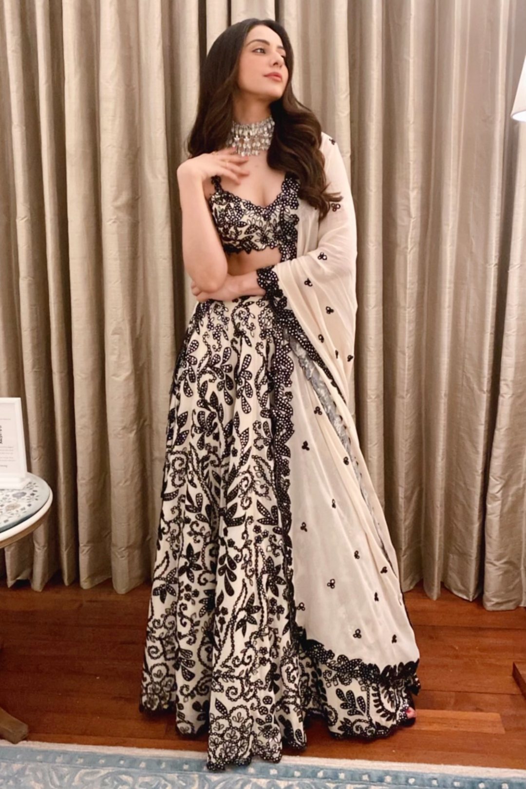 RAKULPREET IN BLACK AND WHITE FLORAL LEHENGA SET